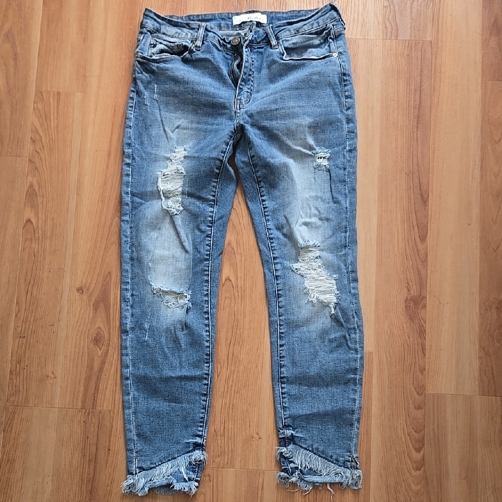 Distressed Blue Jeans